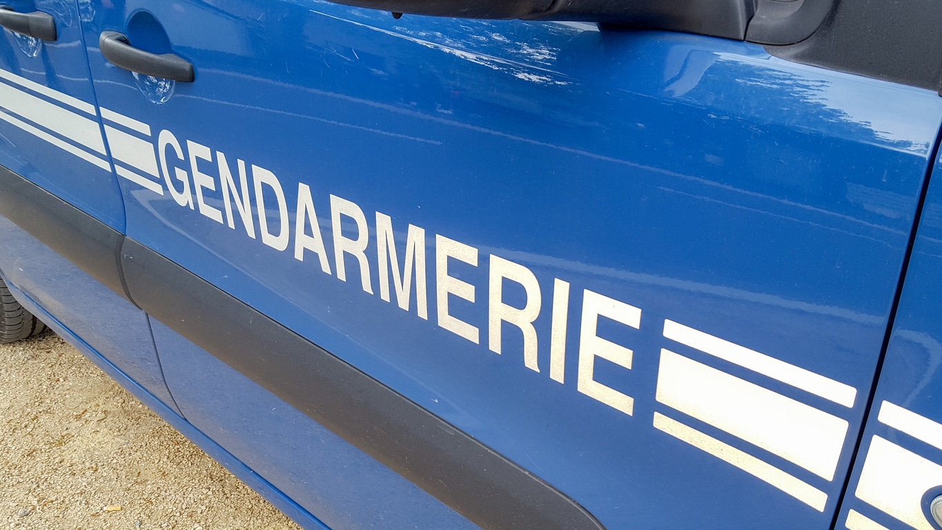 Gendarmerie sign is french police isolated on a car